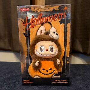 POP Mart - The Monsters Halloween Labubu Sitting Pumpkin Vinyl Plush Pendant